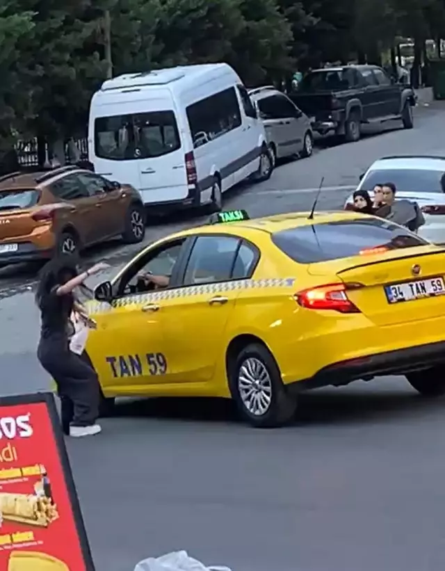 Taksici tartıştığı kızı yumruk atarak bayılttı