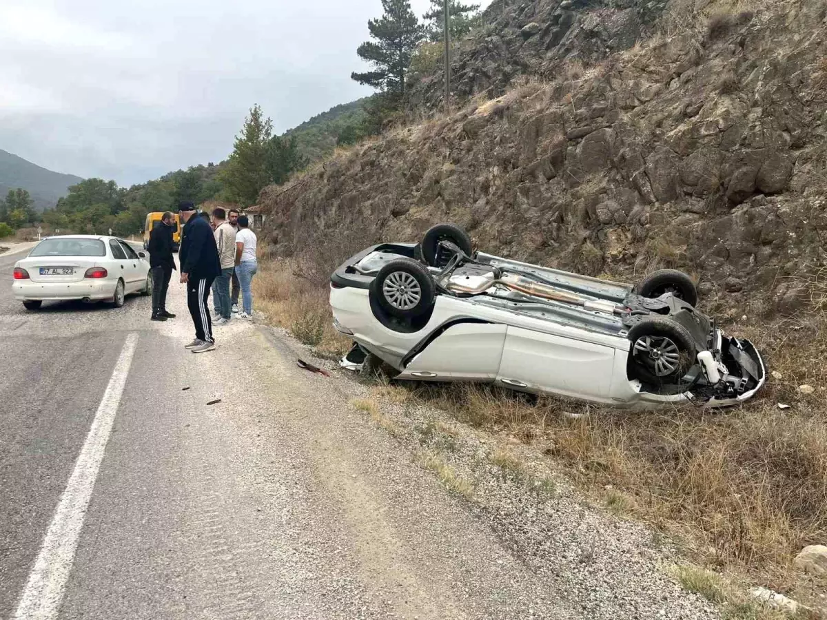 Takla atan araçtan sağ kurtuldu