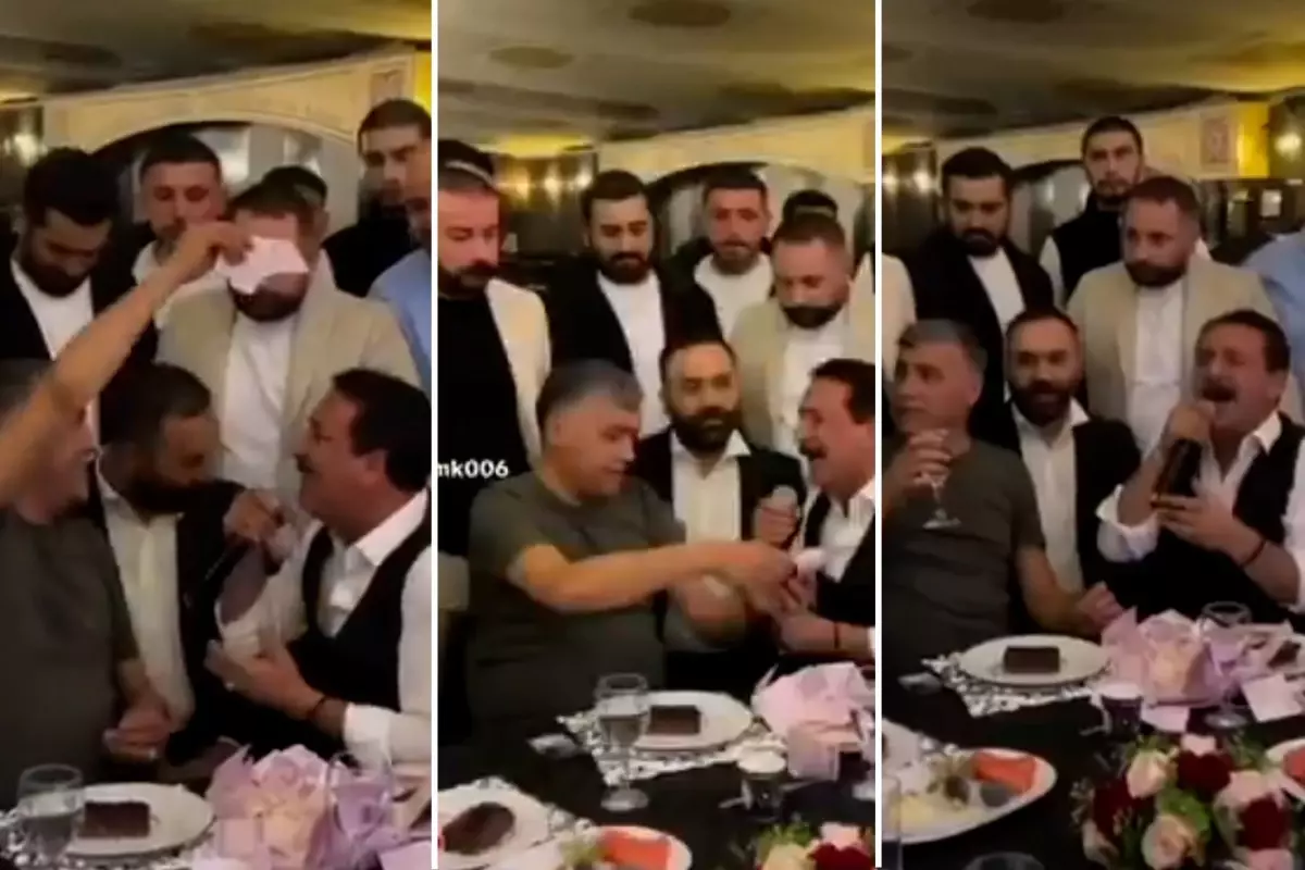 MHP Ankara İl Başkanı, Latif Doğan\'ın başından aşağı desteyle para yağdırdı