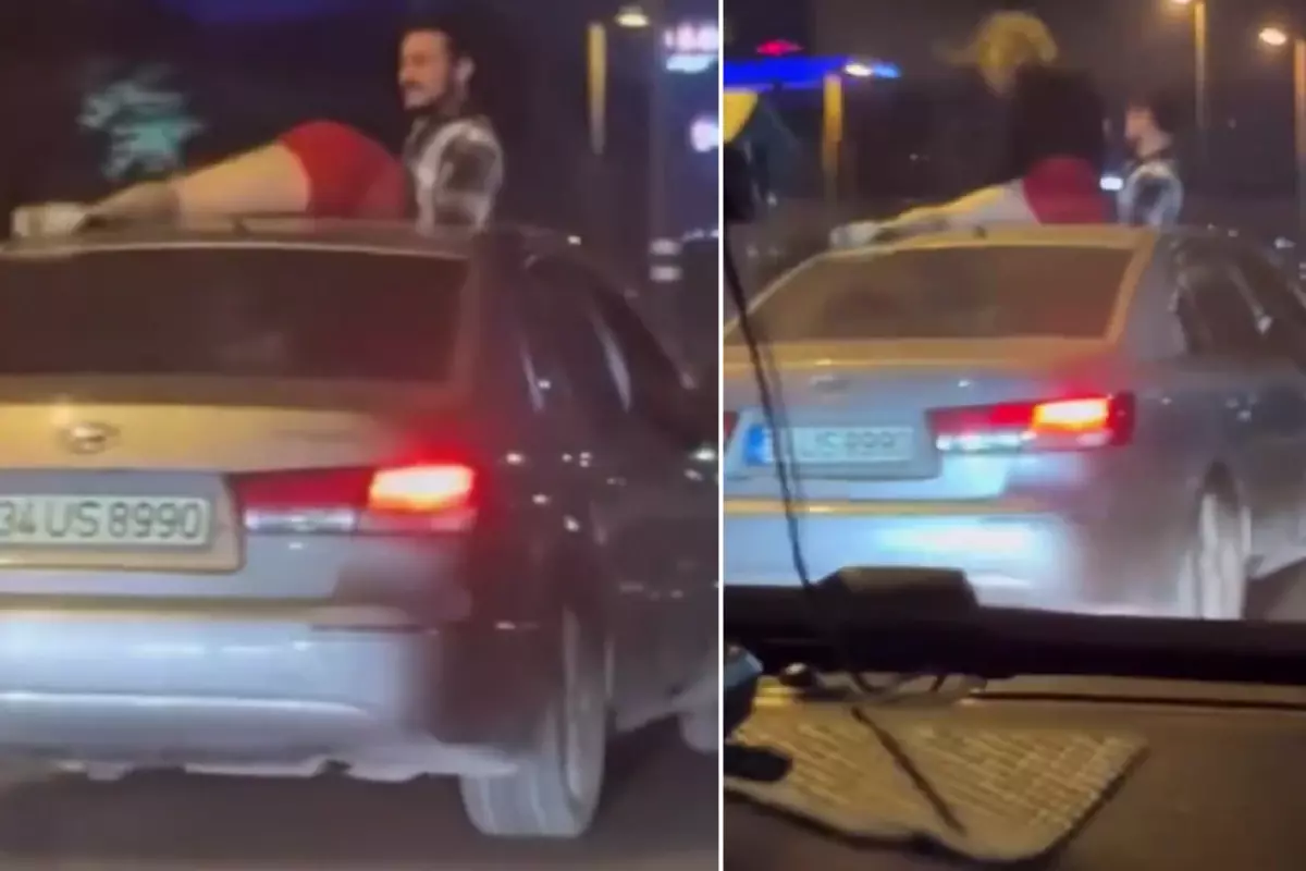 Seyir halindeki otomobilin tavanında twerk yapmaya çalıştı