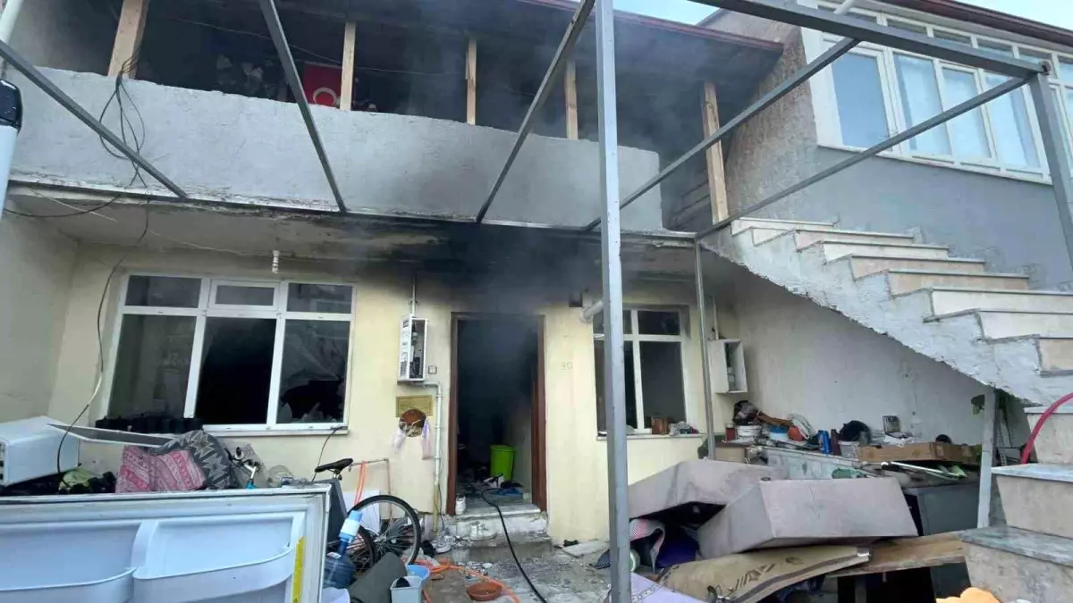 Menteşe\'de ev yangını: 1 gözaltı