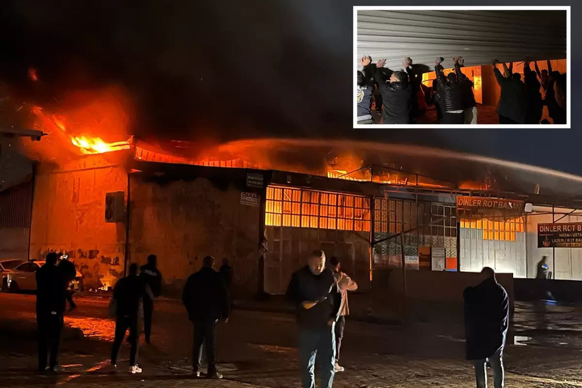 Alevlere teslim olan iş yerlerindeki araçları kurtarmak için zamanla yarıştılar