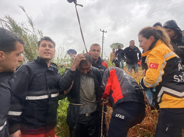 Su basan yoldan geçmeye çalışan araçta can pazarı: 1 ölü, 1 yaralı