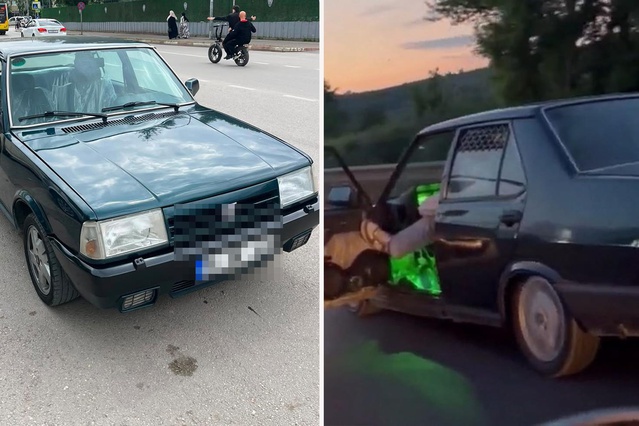 Otomobilinin sol ön kapısını açıp ayağıyla tutarak trafikte ilerledi