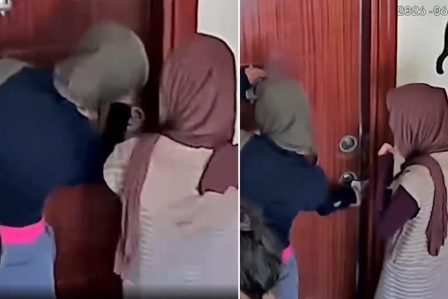 Eve girmeye çalışan hırsızlar kamerayı fark edince binadan k