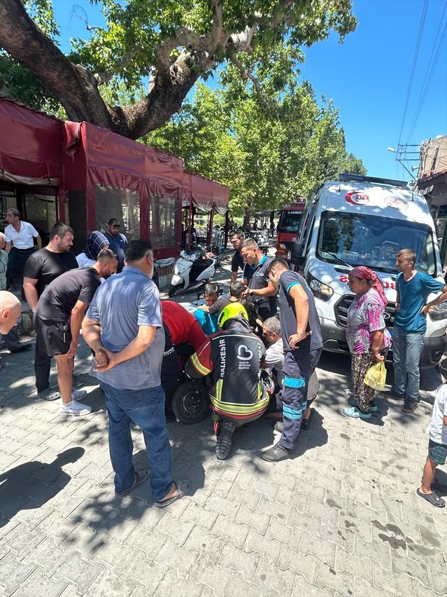 Burhaniye'de Çocuk Elektrikli Bisikletten Yaralandı