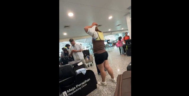 Bagaj ücretinden kaçmak için yaptığı şey herkesi şaşırttı: Hafiflesin diye üst üste giydi