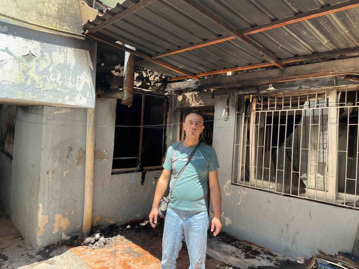 Yangında 7 Yaşındaki Çocuğunu Kurtardı
