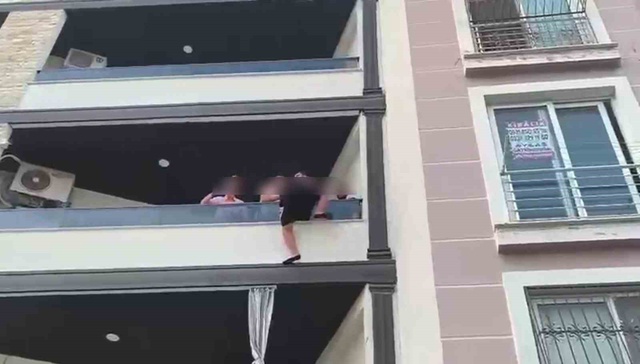 İş yeri kurşunlayan şüphelinin balkondan kaçmaya çalıştığı anlar kamerada