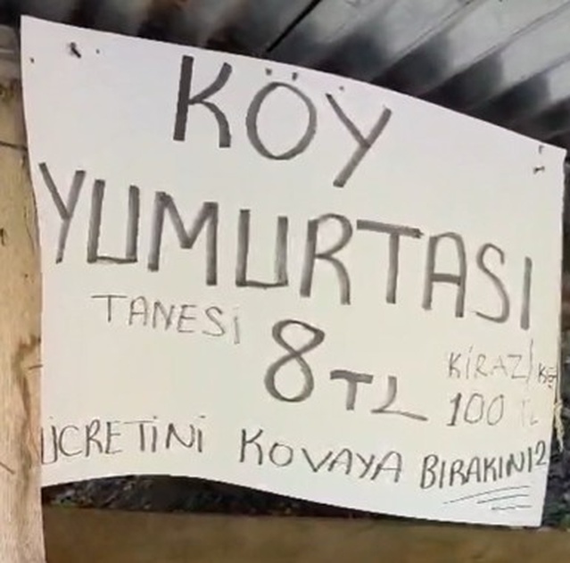 Erzurum İspir'de satıcısız tezgahtan alışveriş yapan ikili 260 TL'yi kovaya bıraktı