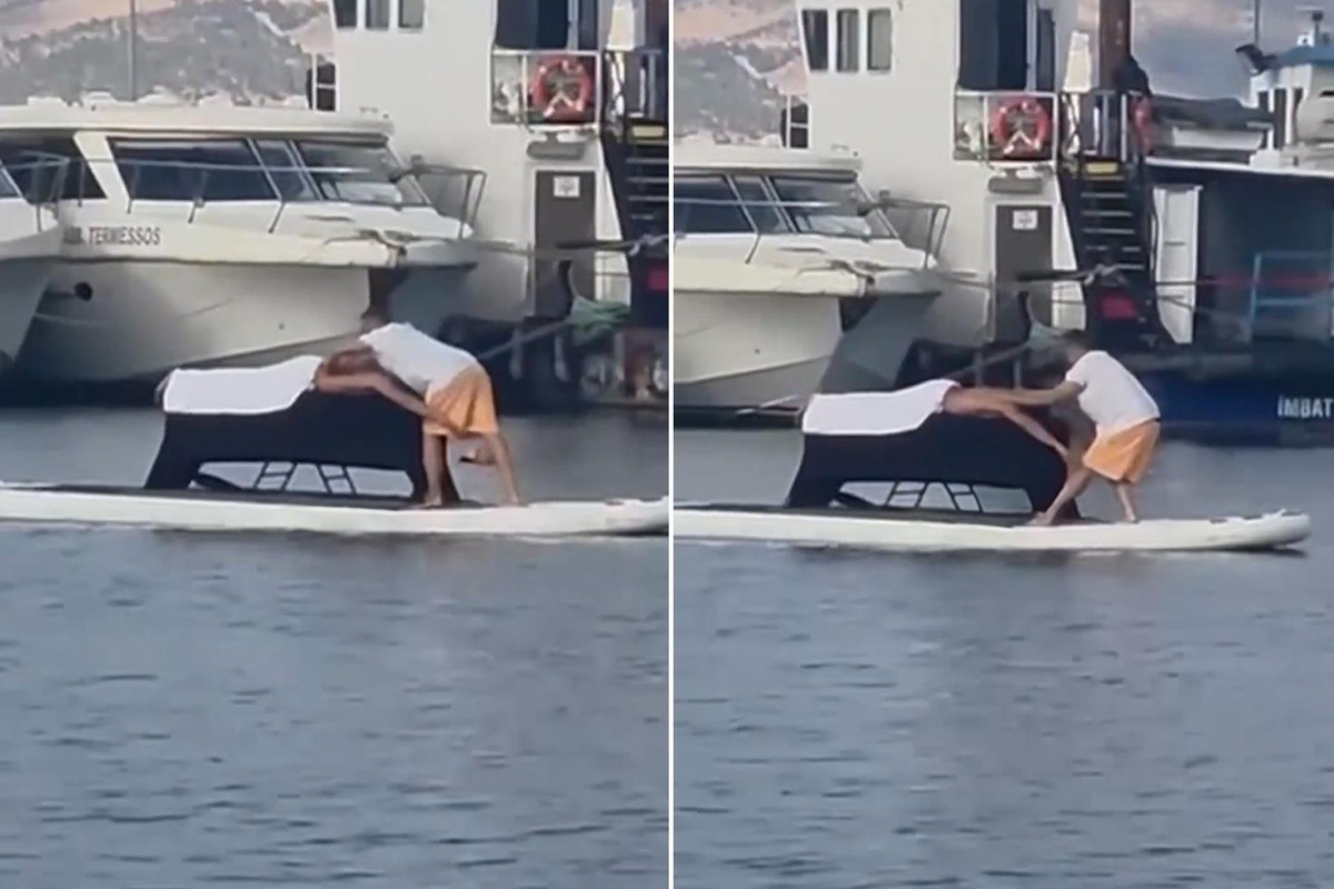 İzmir'de denizin ortasında masaj yaptıran kişinin görüntüleri şaşkınlık yarattı
